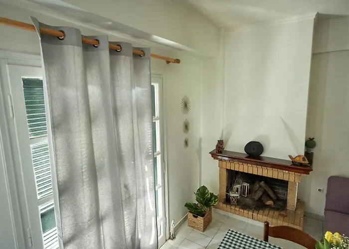 Апартаменты μονοκατοικία στο κέντρο με τζάκι Патра